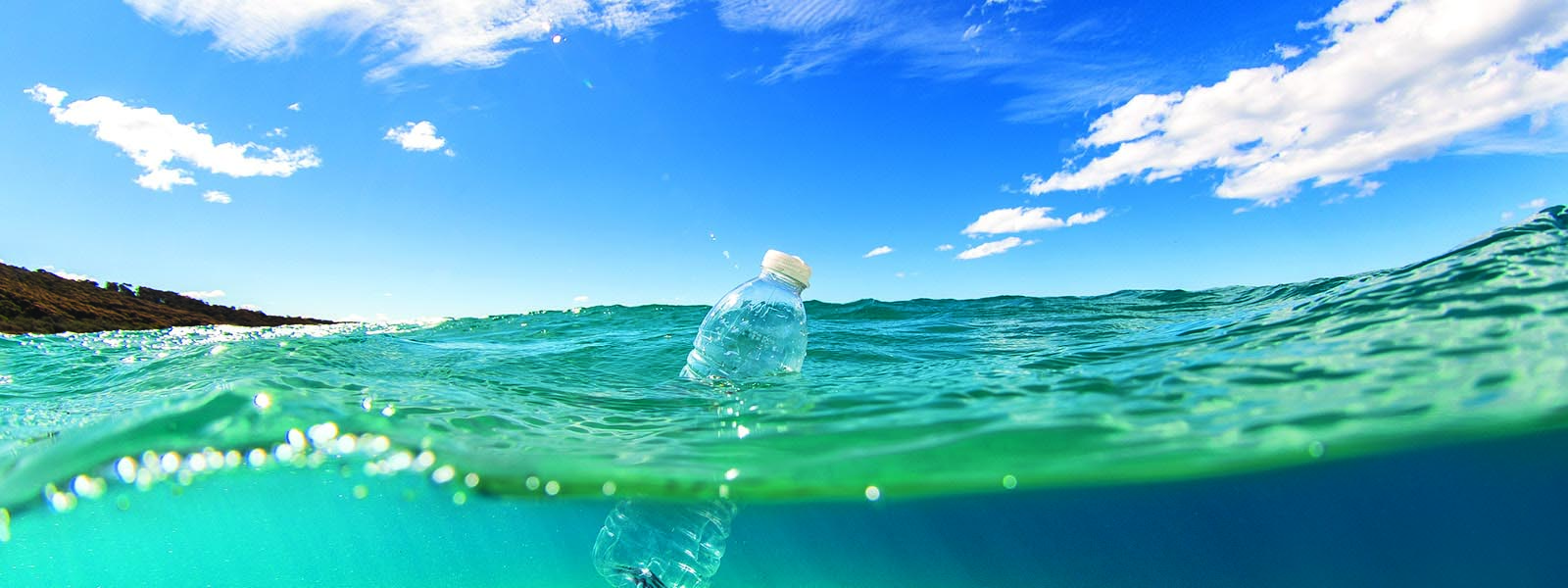 Ocean plastic bottle floating banner web
